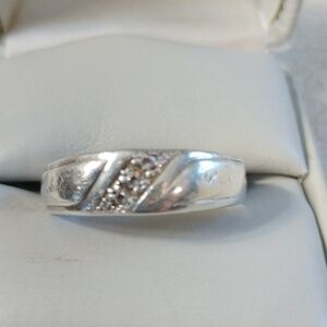 Sterling silver  band with 3 tiny stones size 11 1/2
